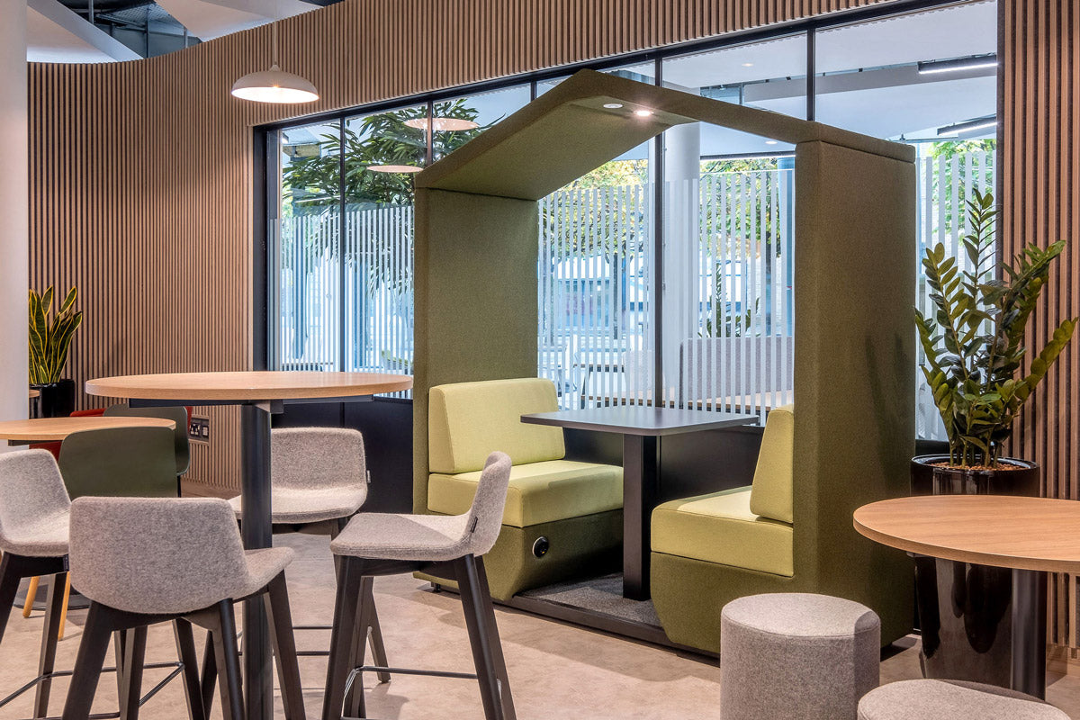 an open sided pitched roof meeting pod in a modern office