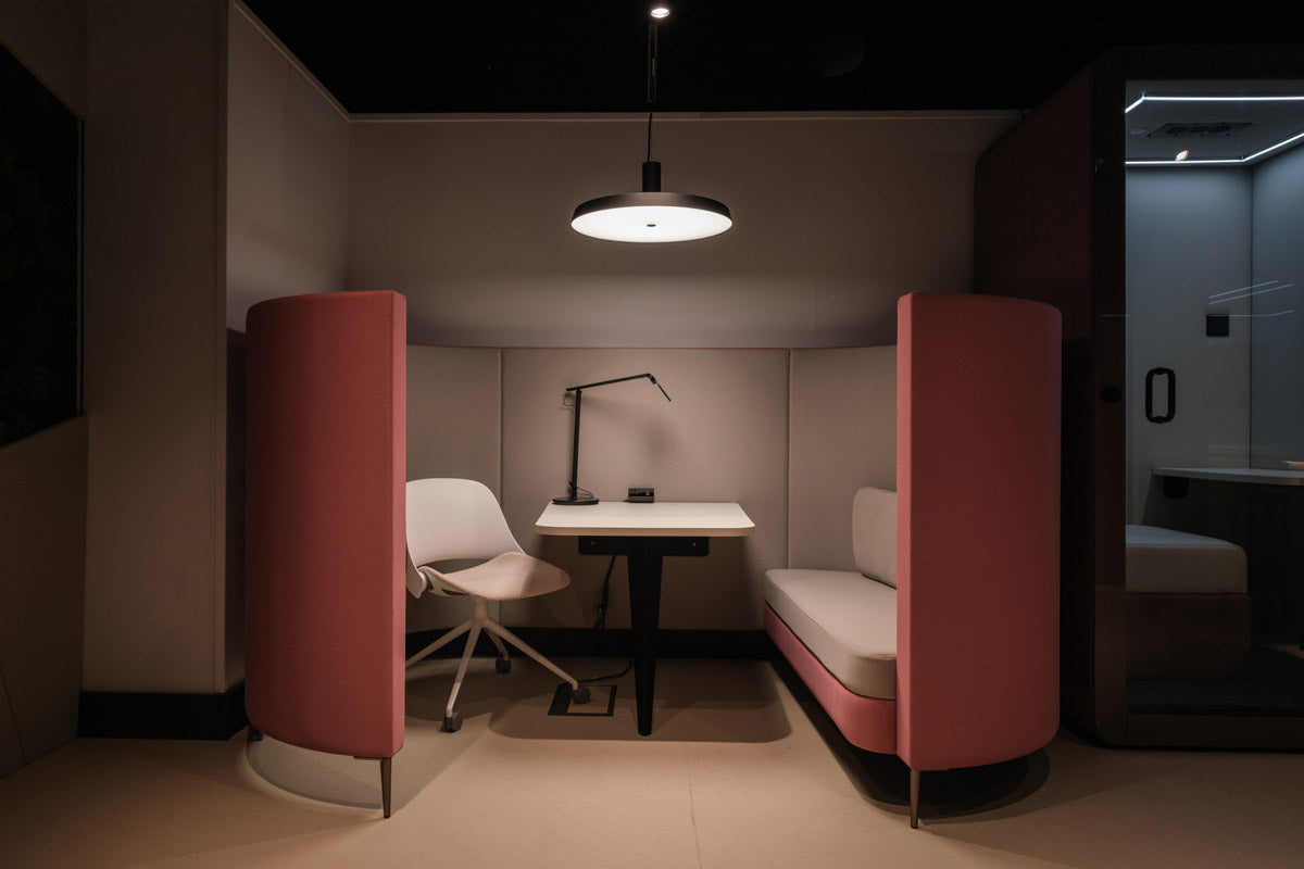 pink 4 person booth sofa in a work place