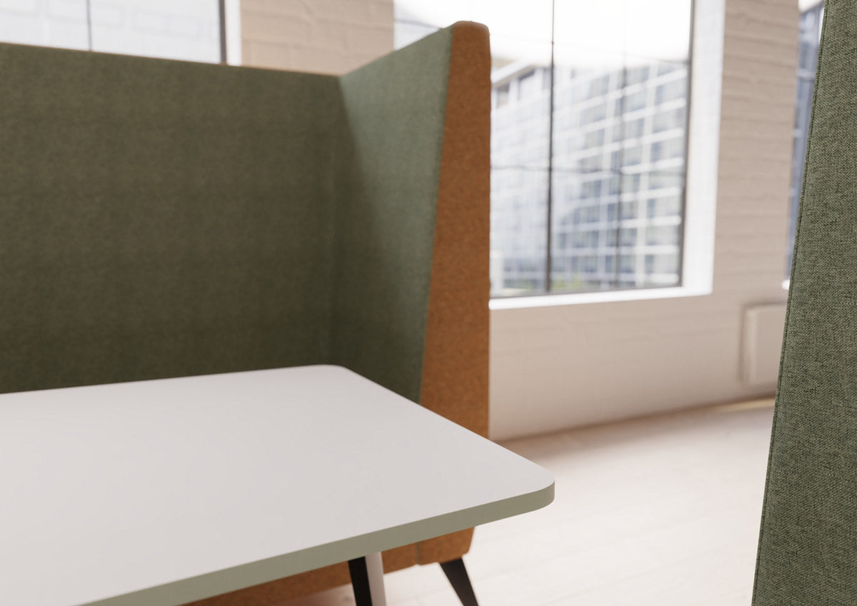 a close up of the table inside a polly booth sofa