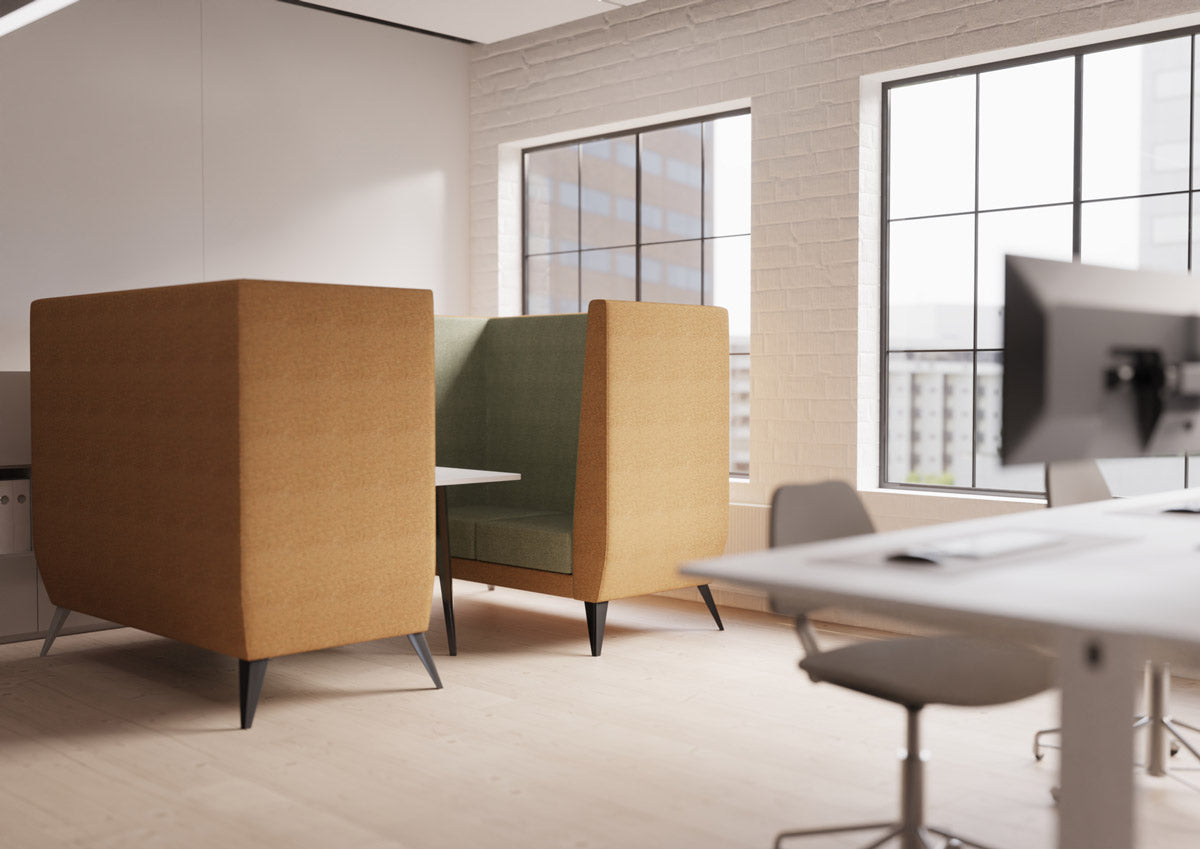 angled 4 person sofa booth with angled black legs in a modern office