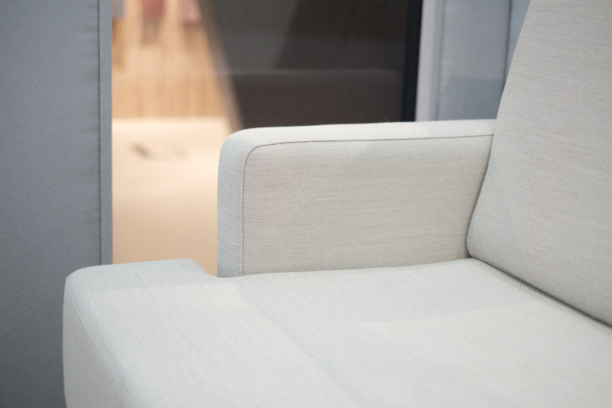 Close up of fabric seams on an office sofa