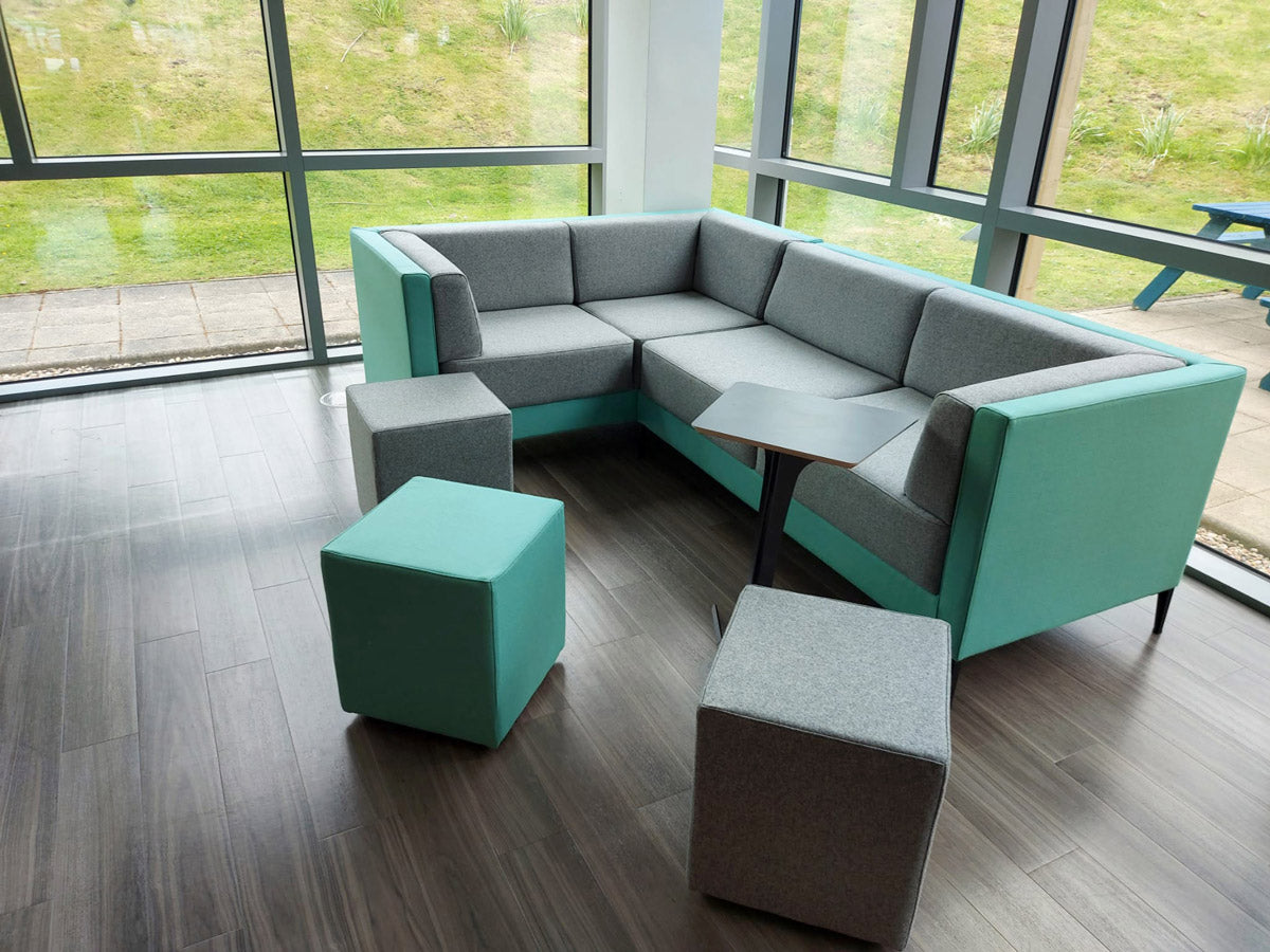 bespoke office corner sofa with footstools and laptop table