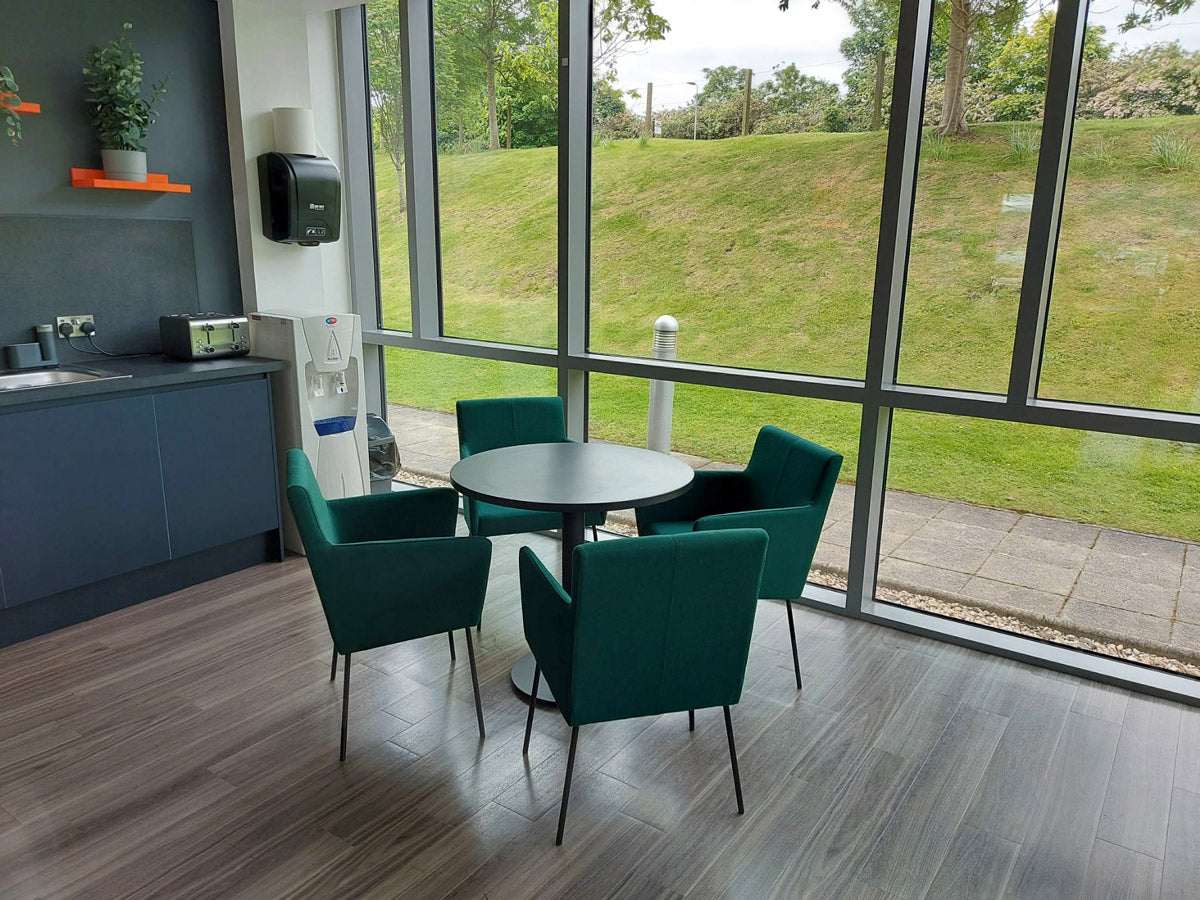 4 jdd office seats and a round table in work canteen