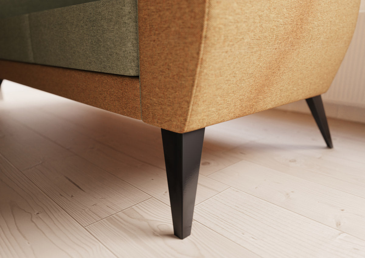 a close up of the angled legs on a JDD Polly booth sofa