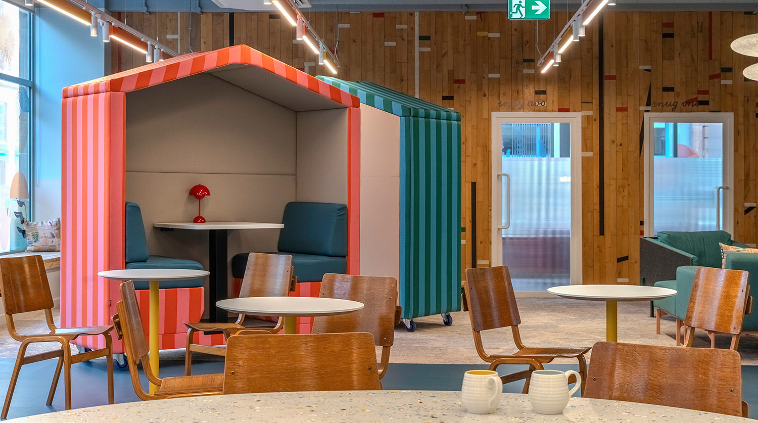 jdd bea 2 seat meeting pod on wheels in a mental health focused interior.