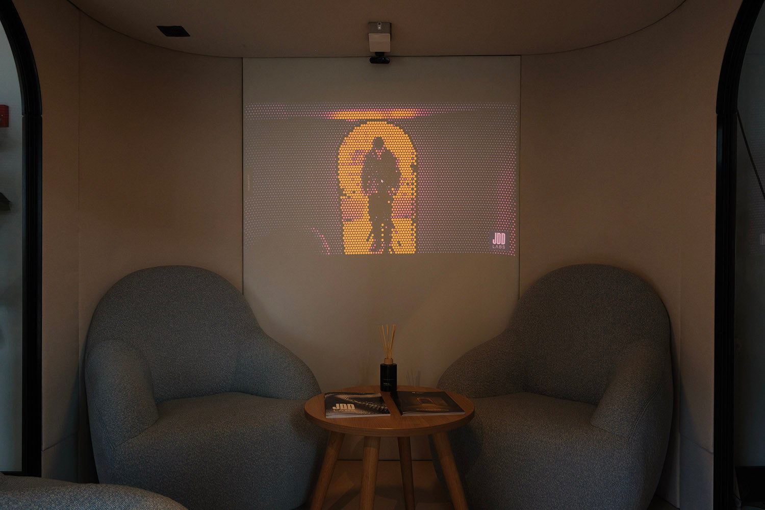 interior of eve wellbeing pod with projections and Luca seating from jdd