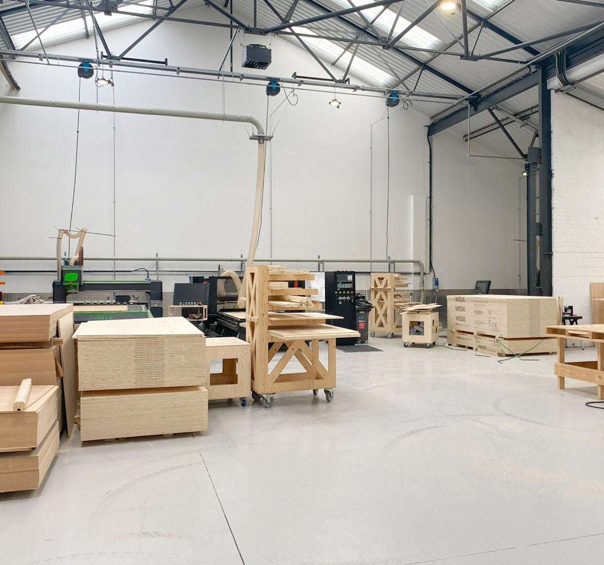 image of JDD woodmill including cnc machines, wooden racking, FSC wood and machines.