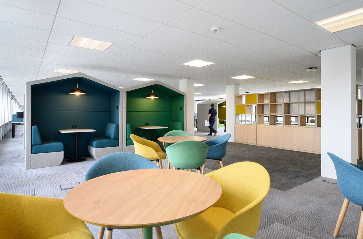 2 open meeting pods with bespoke lighting in a modern workplace