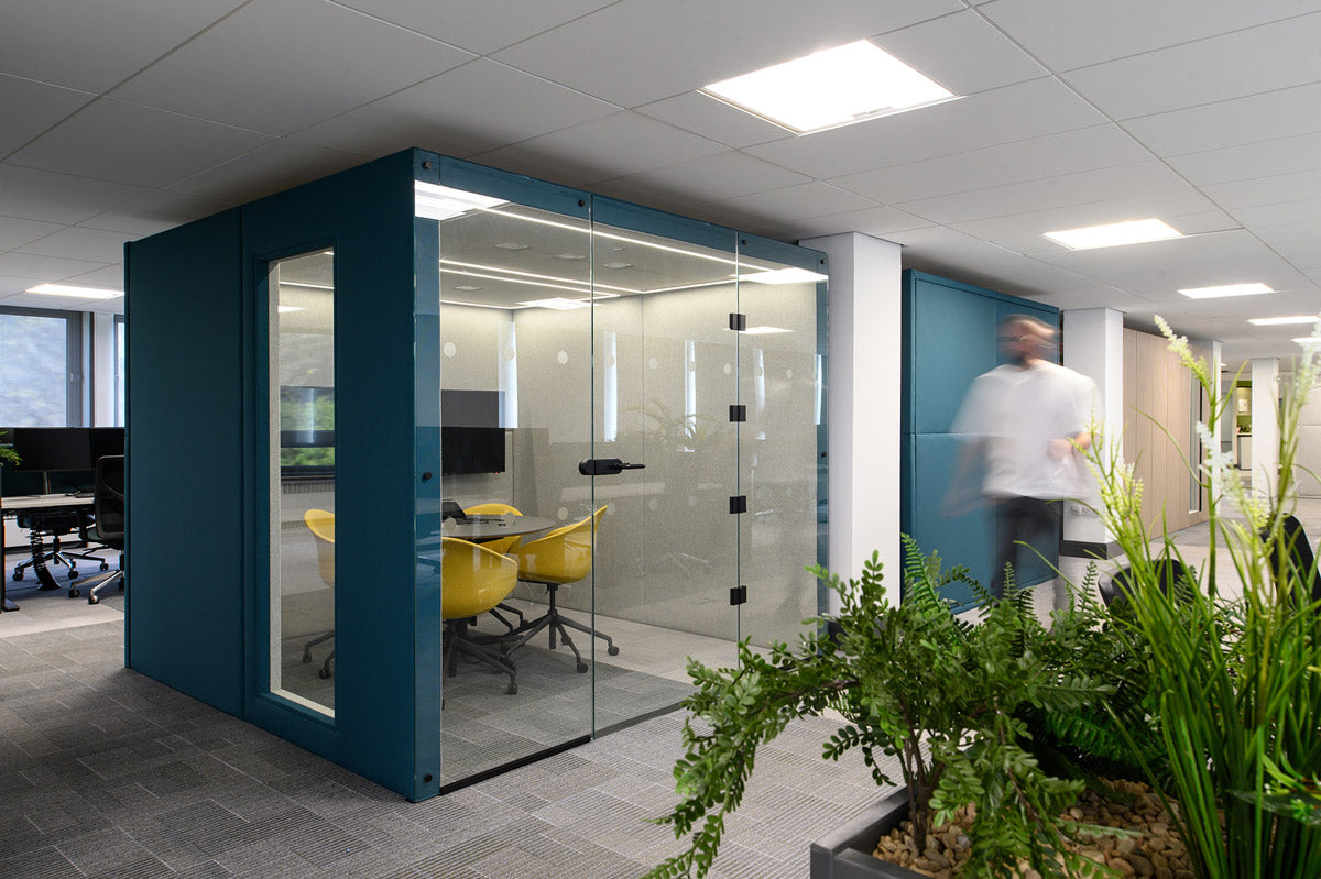 A full size conference room style meeting pod in an open plan office