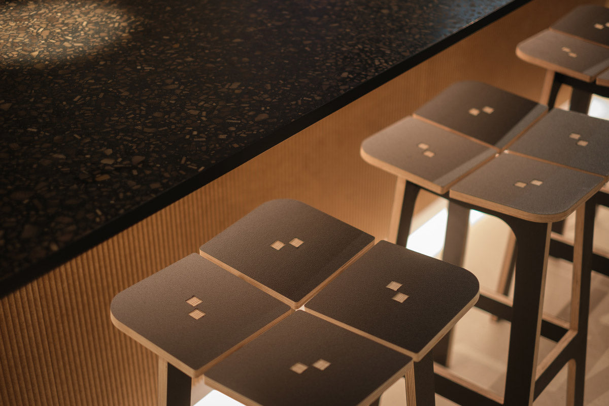 henry stools at a bar