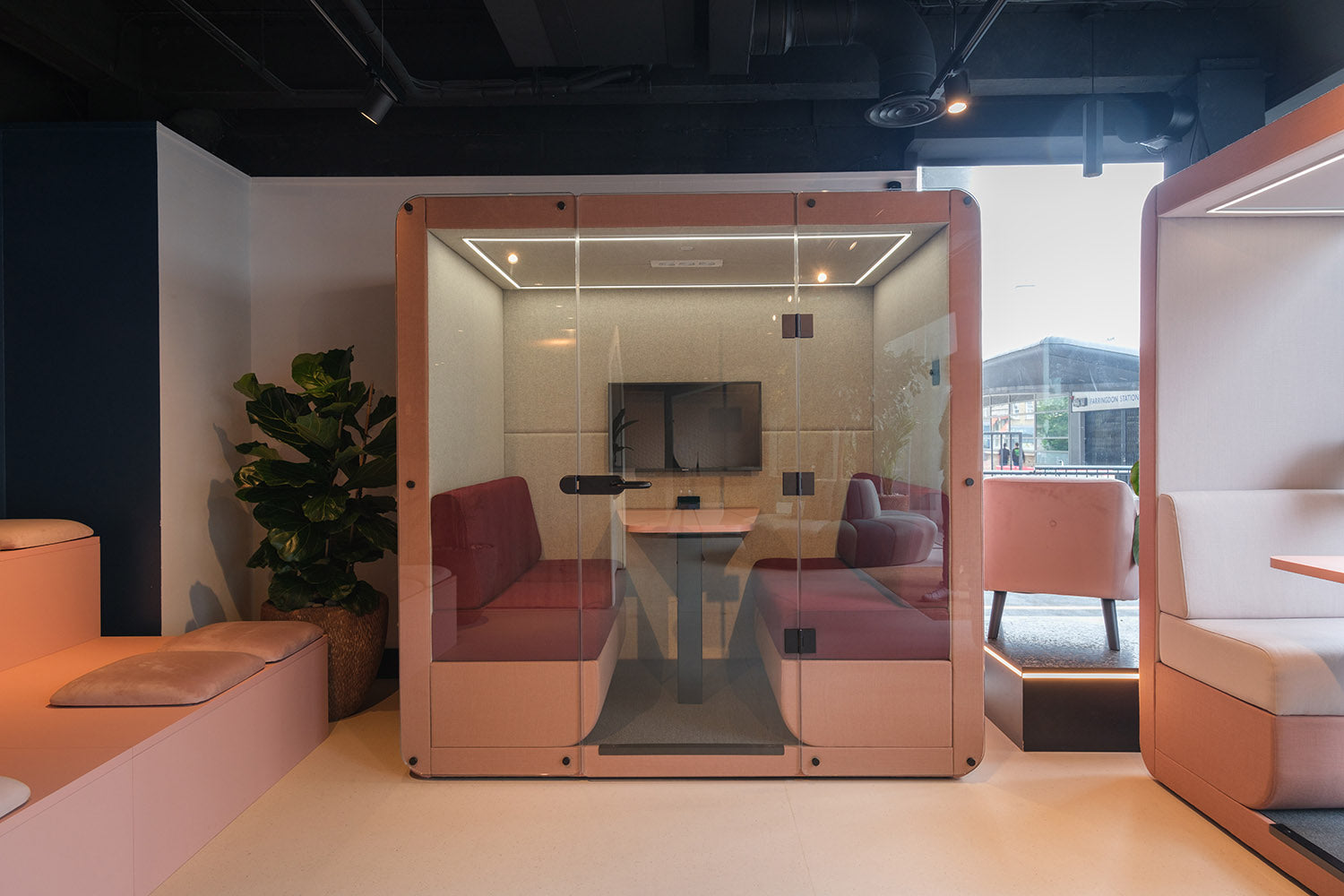 jdd bob 4 seat meeting pod with a glass door and windows