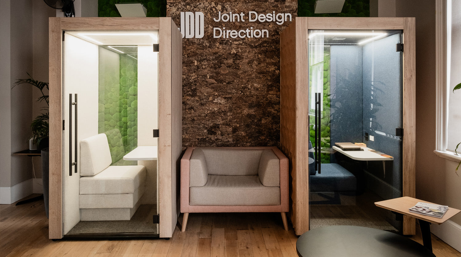 jdd clara single meeting pods. One cladded with acoustic panels, the other with cork.