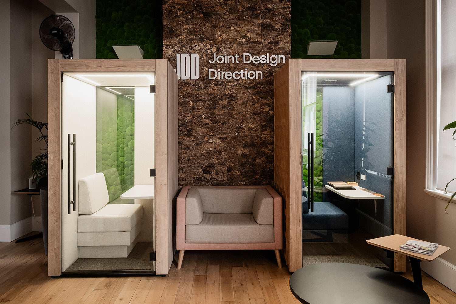 a pair of clara acoustic individual meeting pods