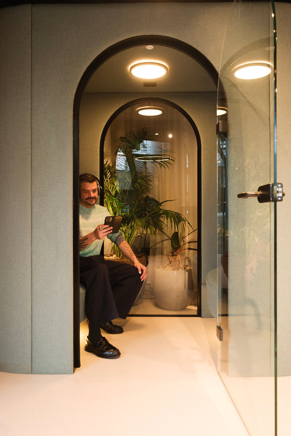 jdd eve wellbeing meeting pod with a man sitting inside