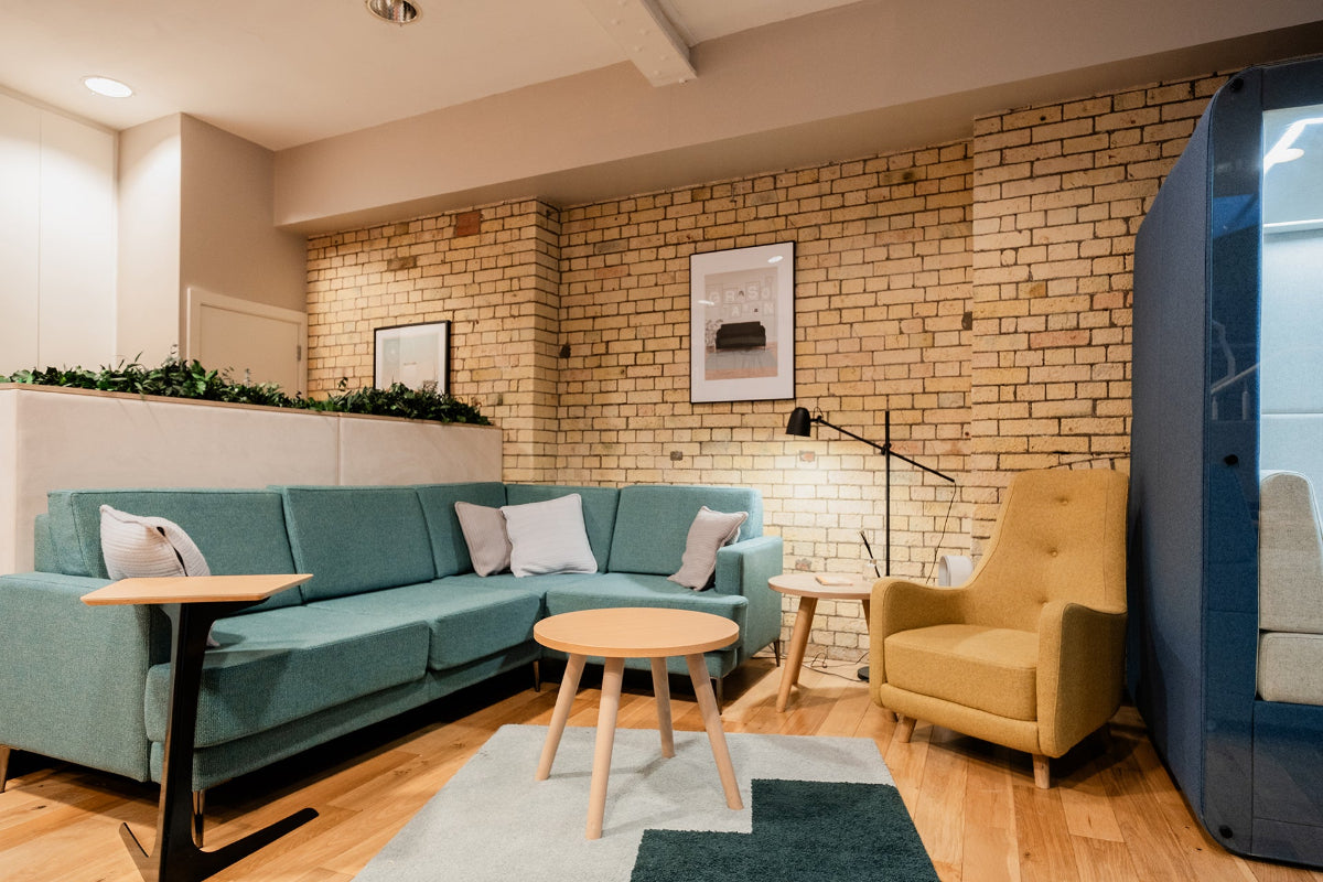 office corner sofa, soft seating and meeting pod in a showroom setting