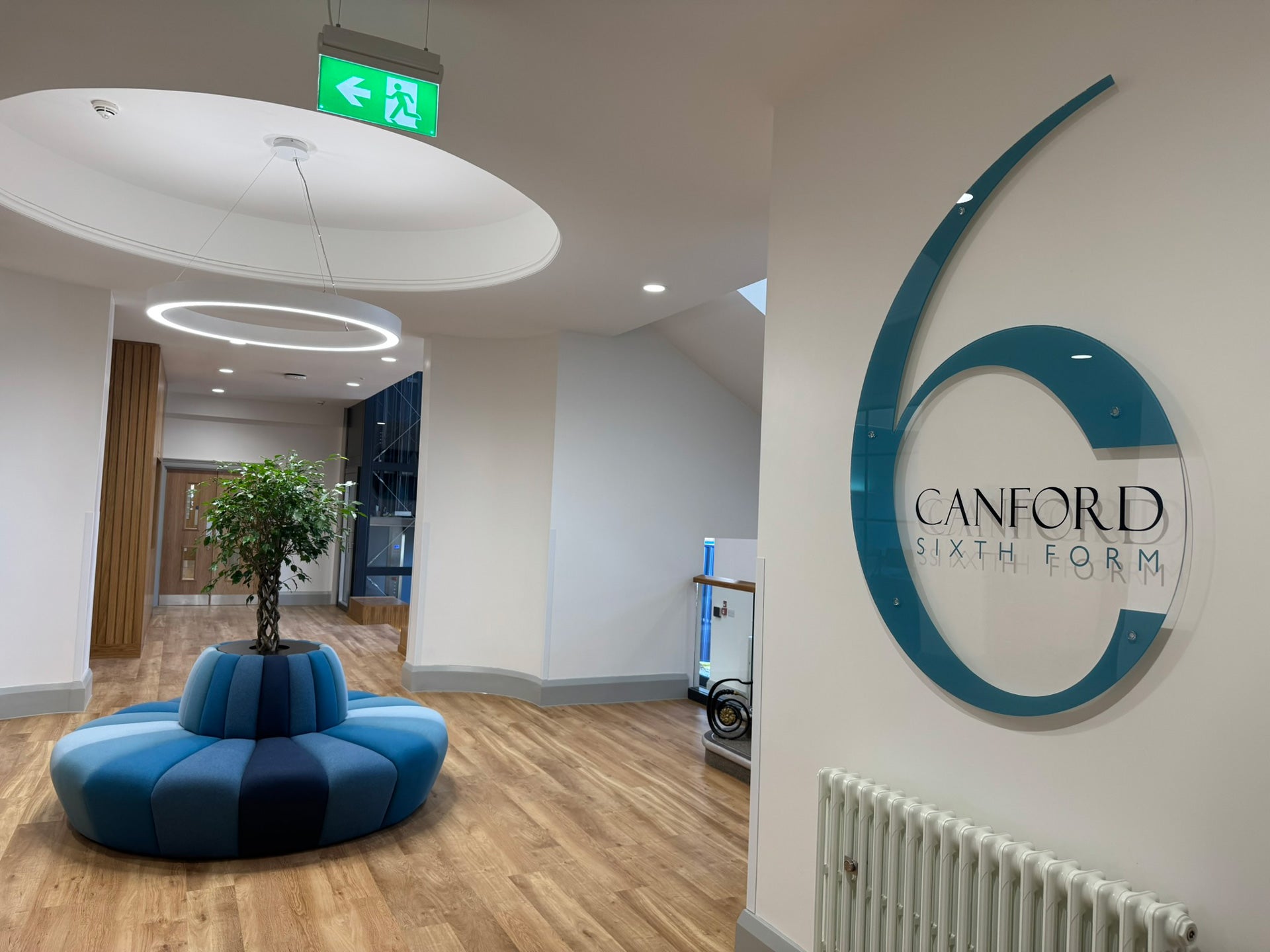 terry banquette seating round with tree planter